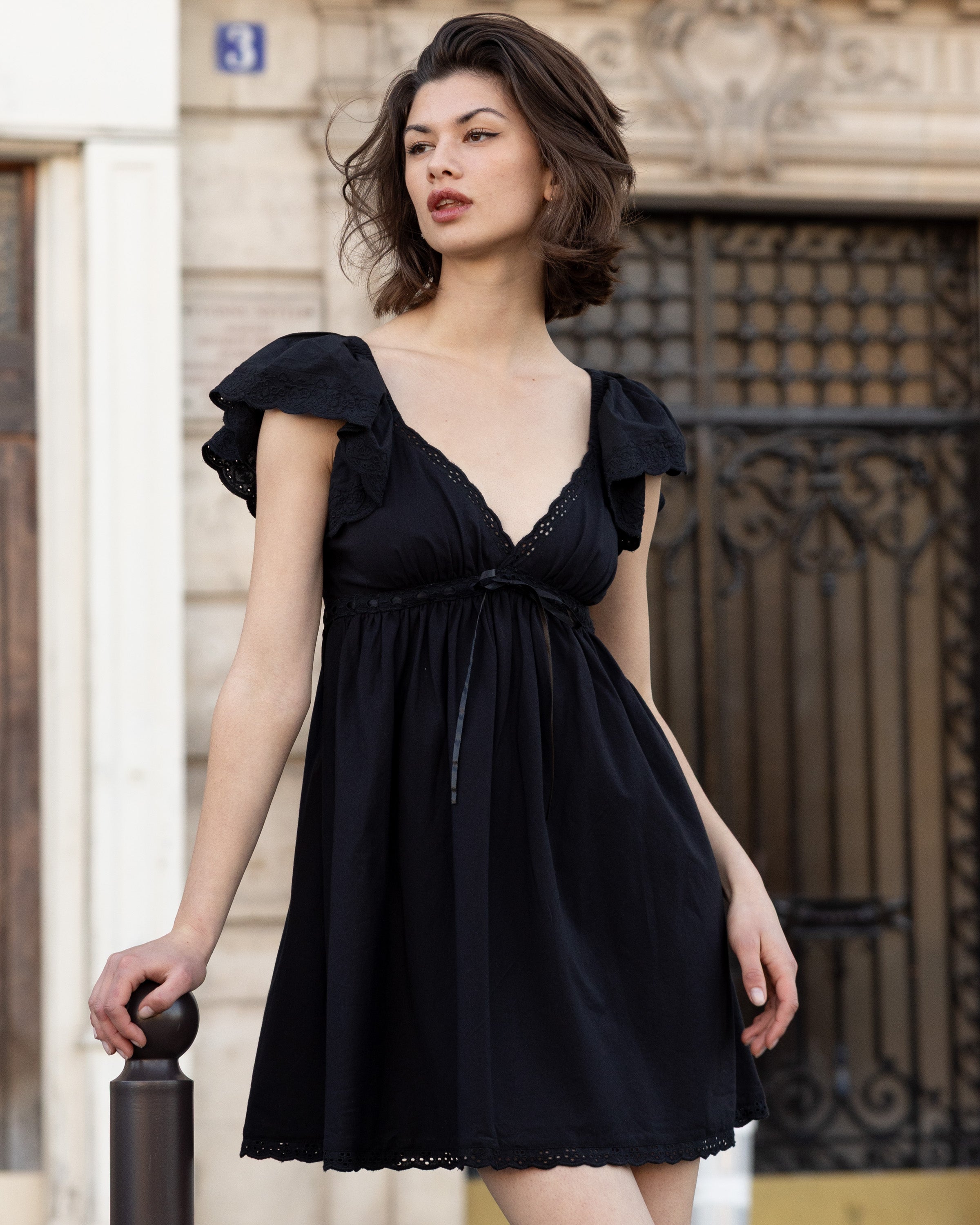 Black cotton mini dress, flutter sleeves, eyelet lace Black cotton mini dress, flutter sleeves, eyelet lace
