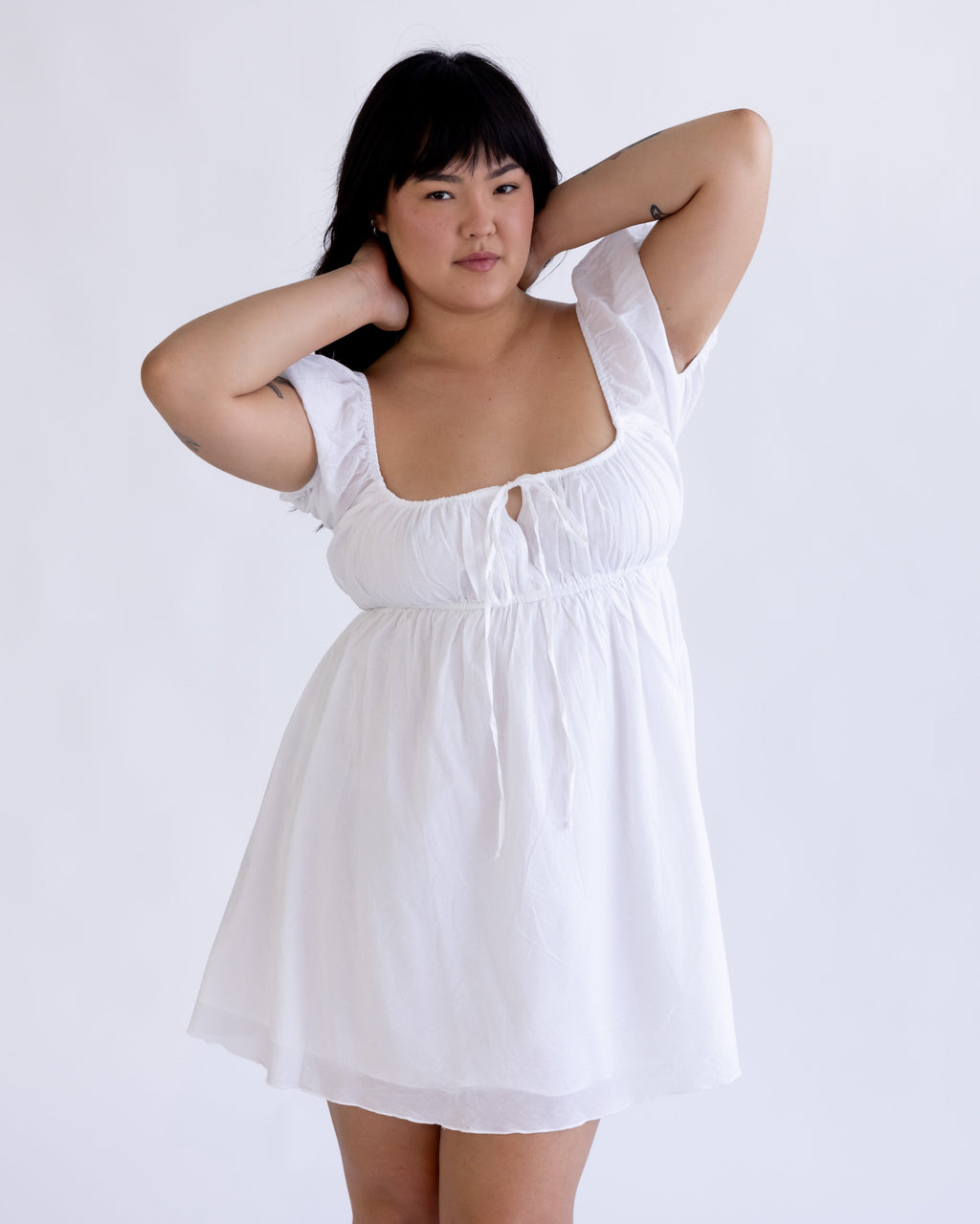*Ashley is wearing size XS and has a 31.5" bust, 23.5" waist, 35" hips, and is 5'5" tall.*