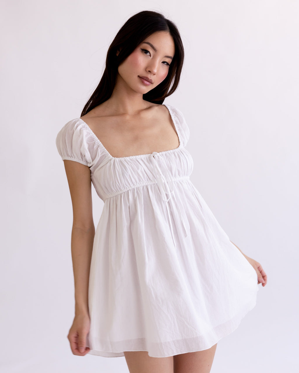 *Ashley is wearing size XS and has a 31.5" bust, 23.5" waist, 35" hips, and is 5'5" tall.*