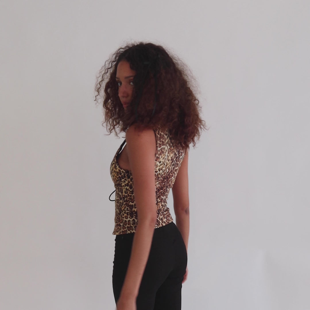 *Carmel is wearing size S and is 5'9" tall, with a 31" bust, 25.5" waist, and 37.5" hips.*